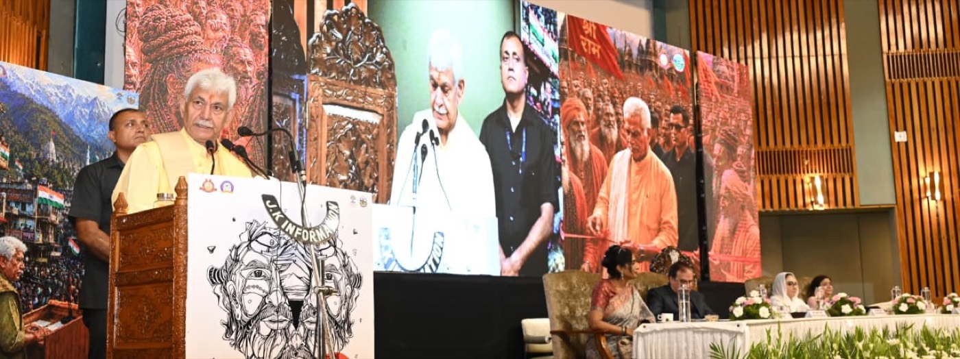 On stage with dignitaries during the proceedings