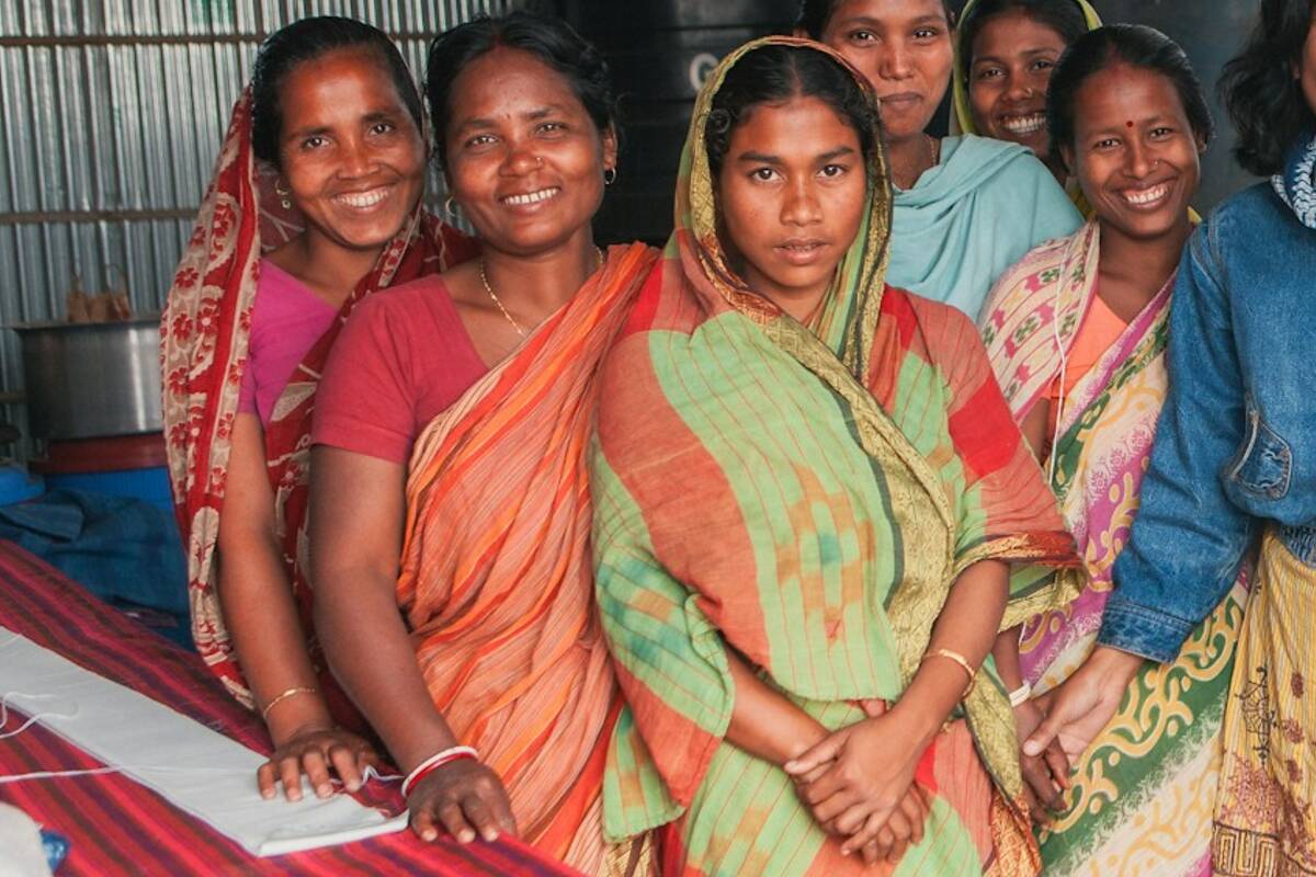 Women of a village community standing together